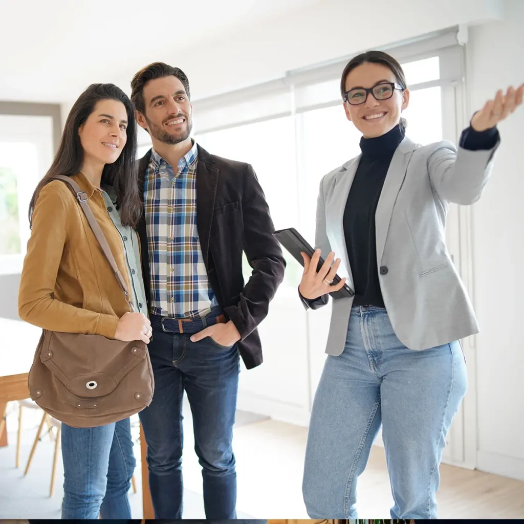 real estate worker showing off a property to prospective home buyers - real estate website design services Collinsville Illinois - metro east - St. Louis Metro - Central Illinois - Springfield IL