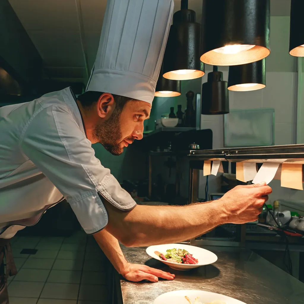 restaurant chef looking at an order ticket - restaurant owners website design solutions - Collinsville Illinois - metro east - St. Louis Metro - Central Illinois - Springfield IL