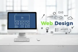 Right Click Digital, Inc. —Web design studio concept with a computer display on a desk and web design text with sketch web page elements in St. Louis, MO.